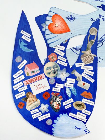 Pièce en carton avec forme de colombe décorée avec de mets et d'images